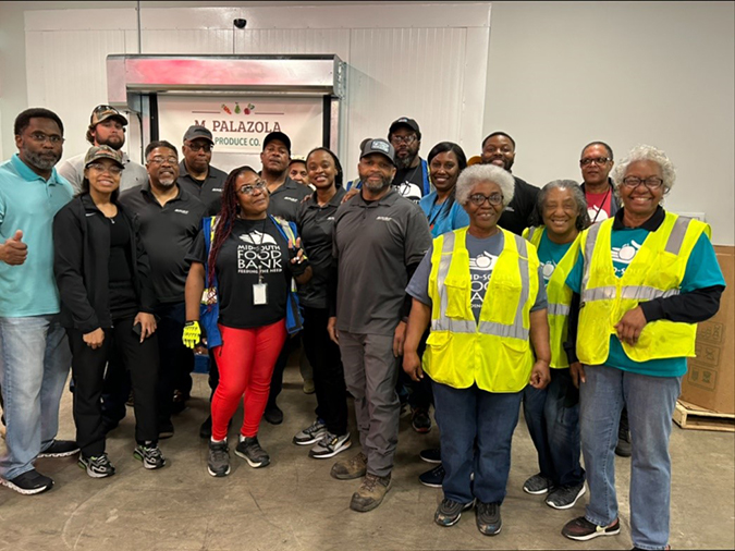 Memphis Diversity council volunteering at Mid-South Food Bank. 