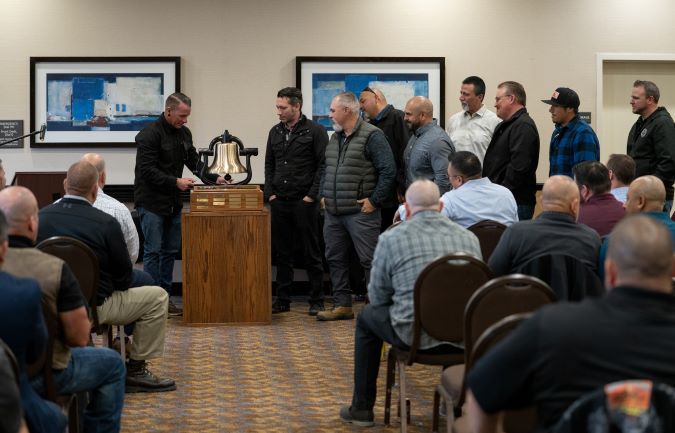 California Division Engineering employees receive their bell. 